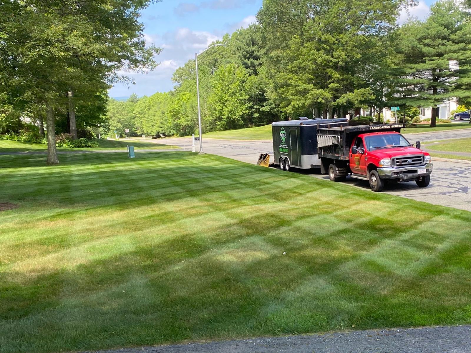 Martins K Landscape crew and truck at work